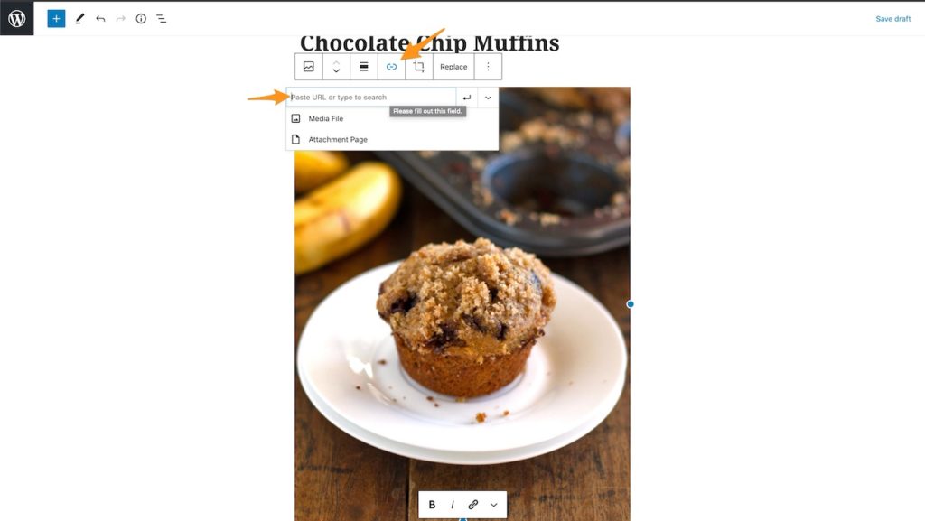 arrows showing how you can add a link to an image in WordPress 
