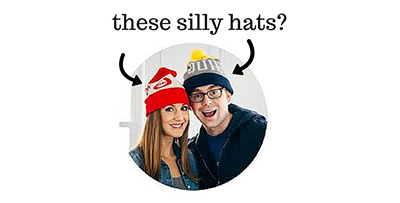Bjork and Lindsay Ostrom wearing hats with text that reads 'these silly hats?'