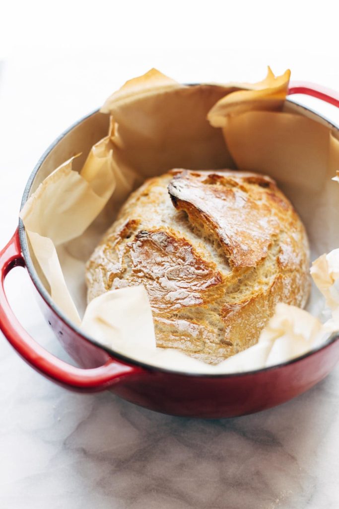 No knead bread in a dutch oven shot at three-fourths height