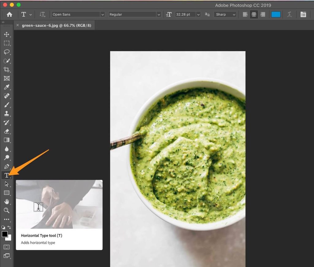 An orange arrow pointing to the text tool in Photoshop