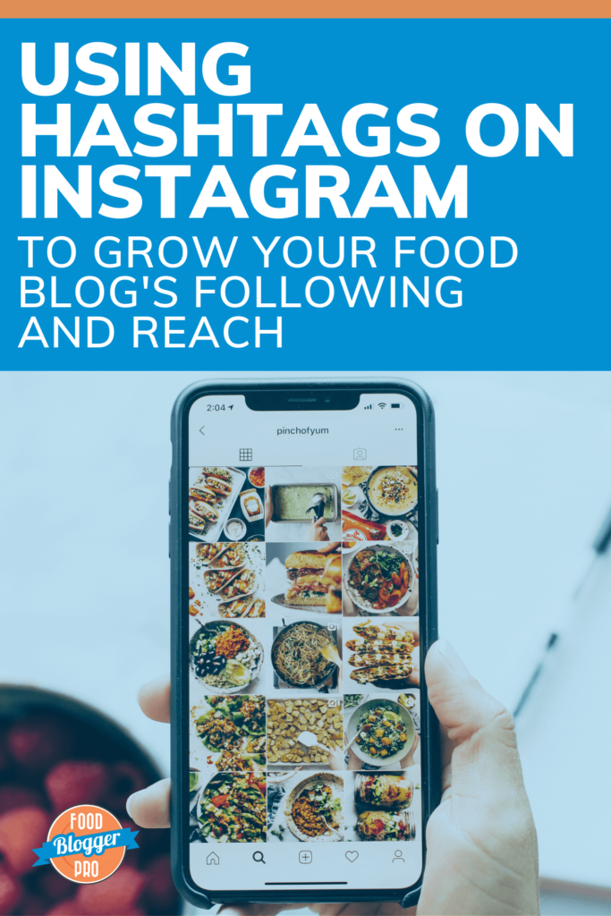 Blue and orange graphic that reads 'Using Hashtags on Instagram to Grow Your Food Blog's Following and Reach' with an iPhone showing the Pinch of Yum Instagram account