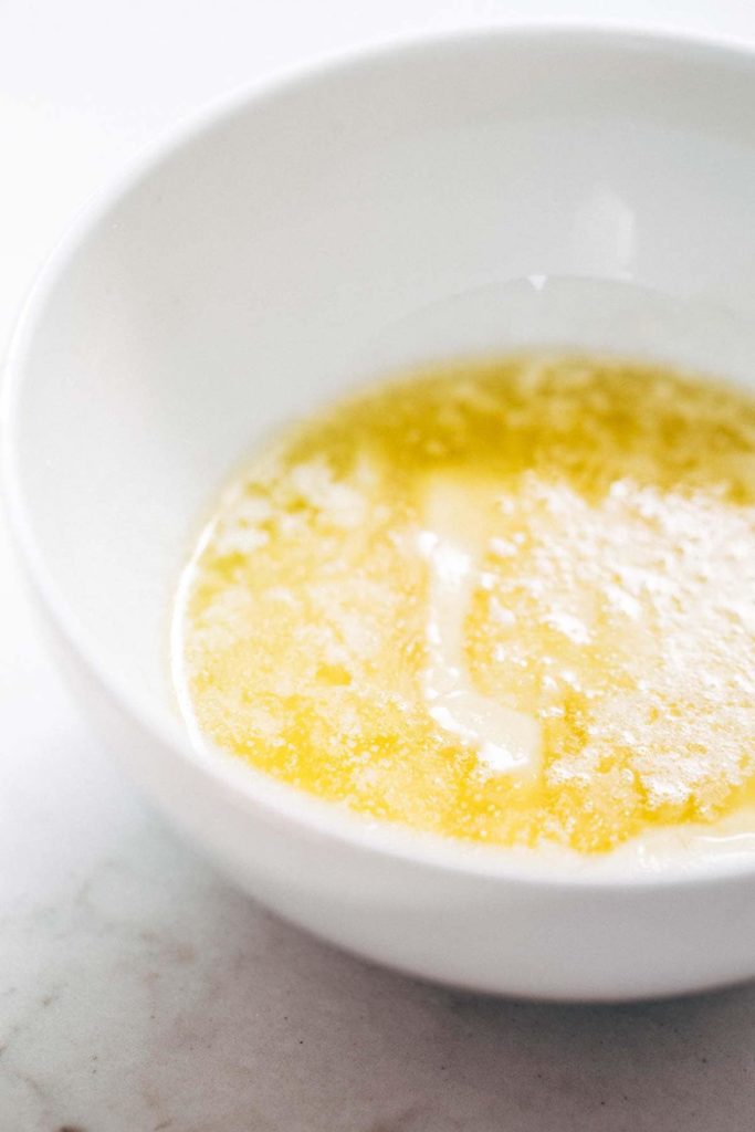 Bowl of melted butter on top of kitchen counter