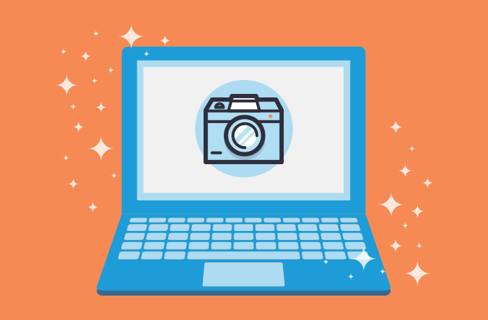 a picture of a computer with a camera icon the screen against an orange background