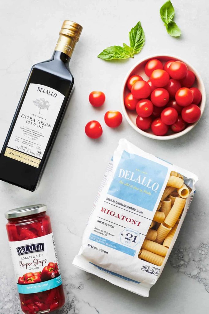 Pasta, tomatoes, olive oil and roasted red peppers