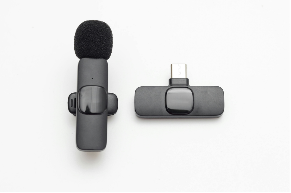 A wireless mic on a white background.