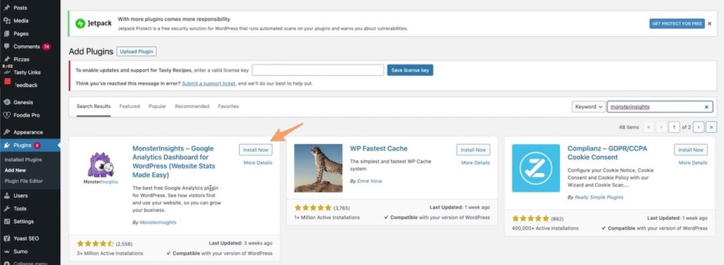 the MonsterInsights plugin in the WordPress plugin repo with an orange arrow pointing to Install Now