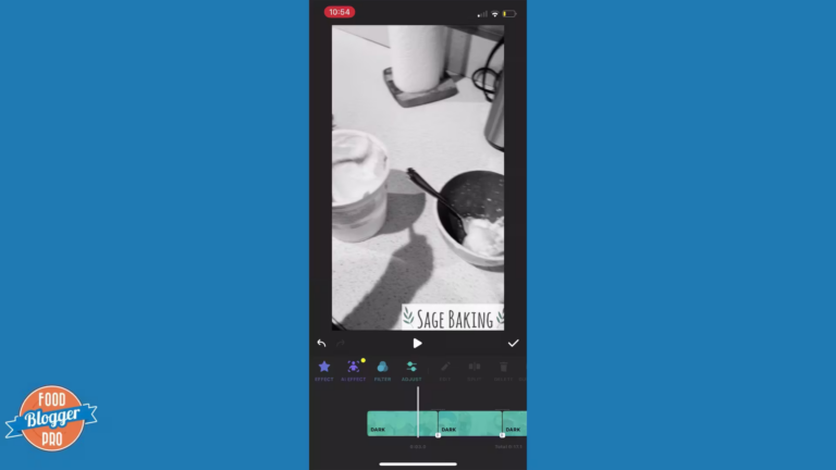 a screenshot of a video being edited within the InShot app on a blue background